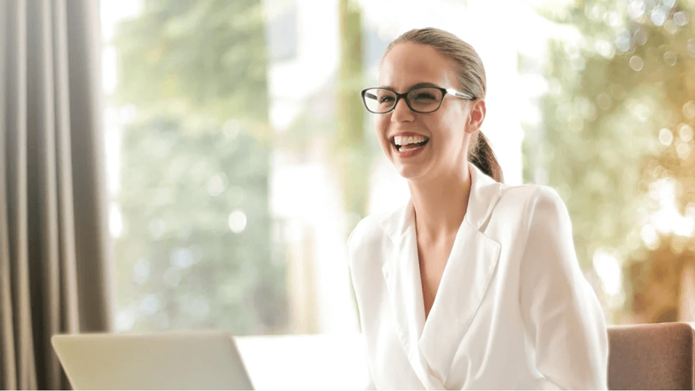 Woman laughing.