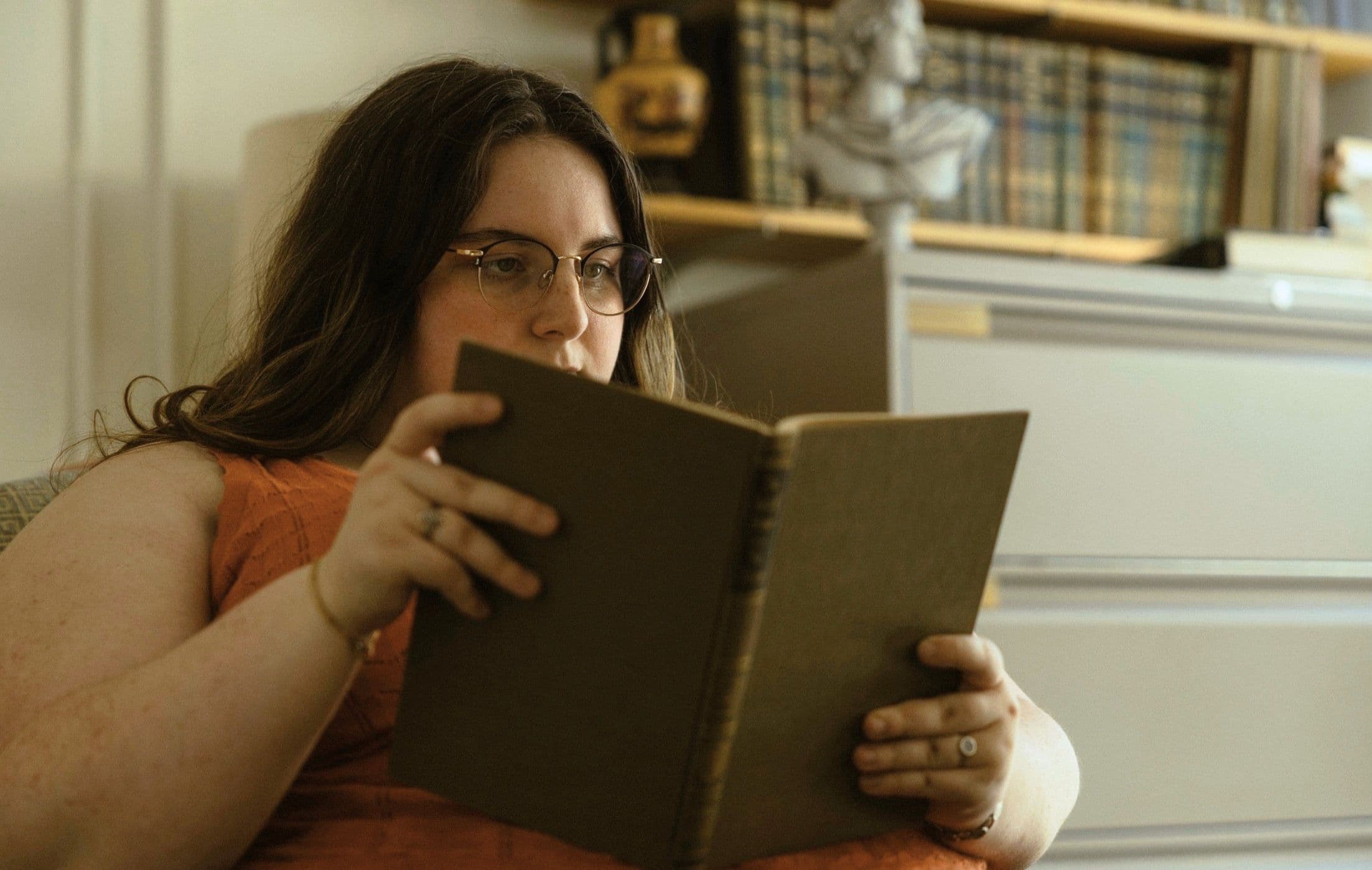 A student reads a book