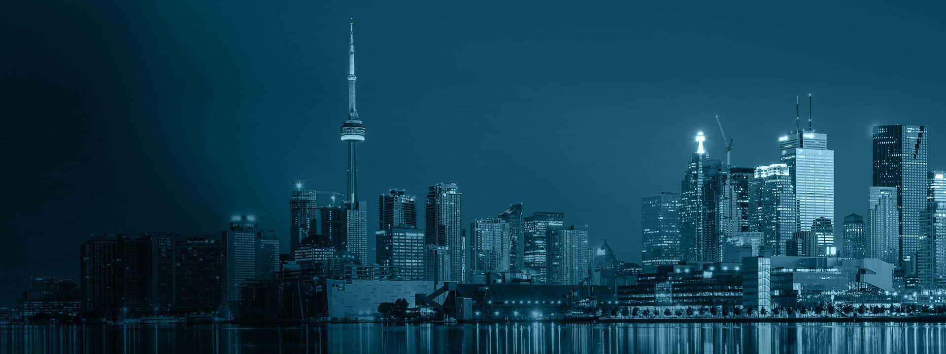 Toronto landscape with multiple buildings and a blue overlay.