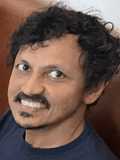 Headshot of Anand Yethiraj.